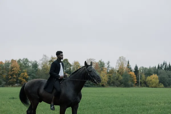 Photographer on horseback